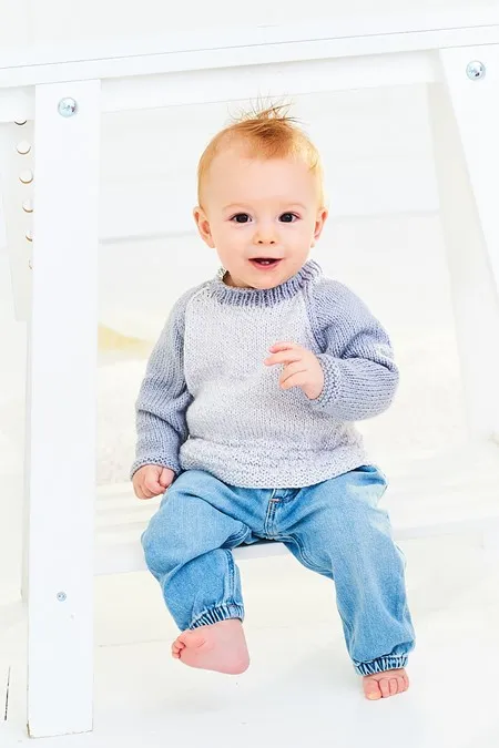 Knitting Pattern - DK Baby Raglan Sweaters by Stylecraft 9999