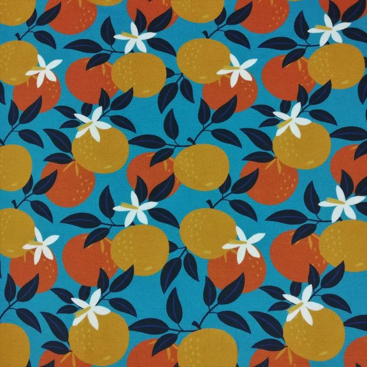 Cotton Jersey Fabric with Orange Blossoms on Blue