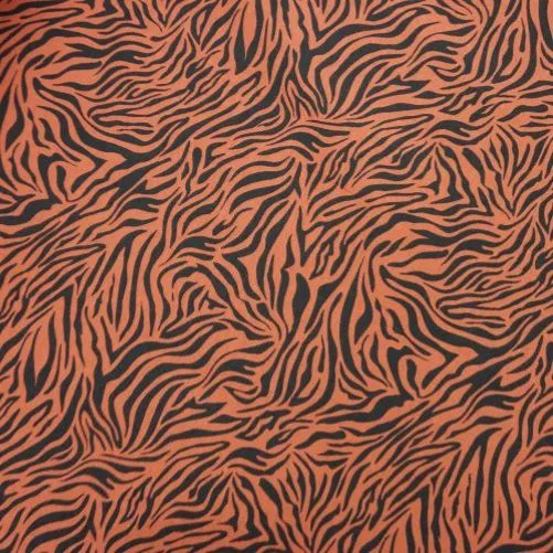 REMNANT - 0.93m - Jersey Fabric Rust with Black Tiger Animal Print 