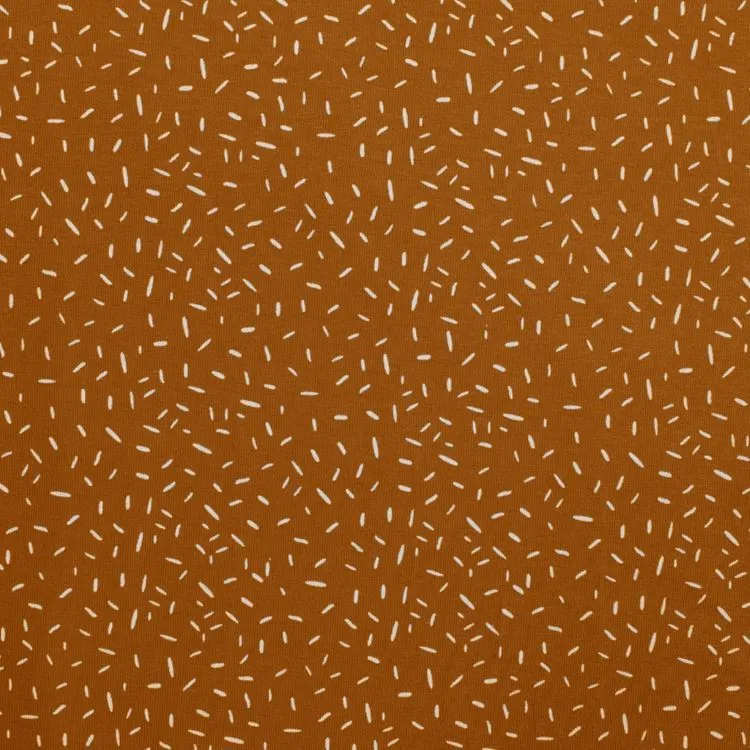 Cotton Jersey Fabric with White Confetti On Caramel Brown